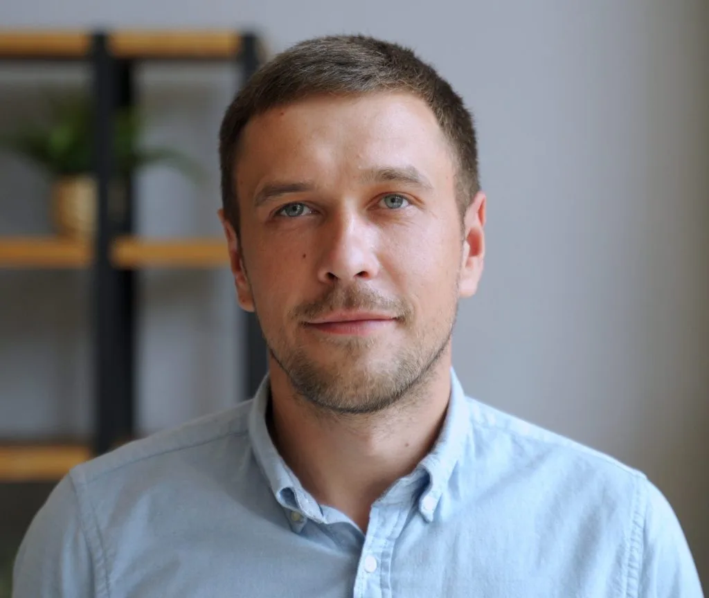 Man in a light blue shirt