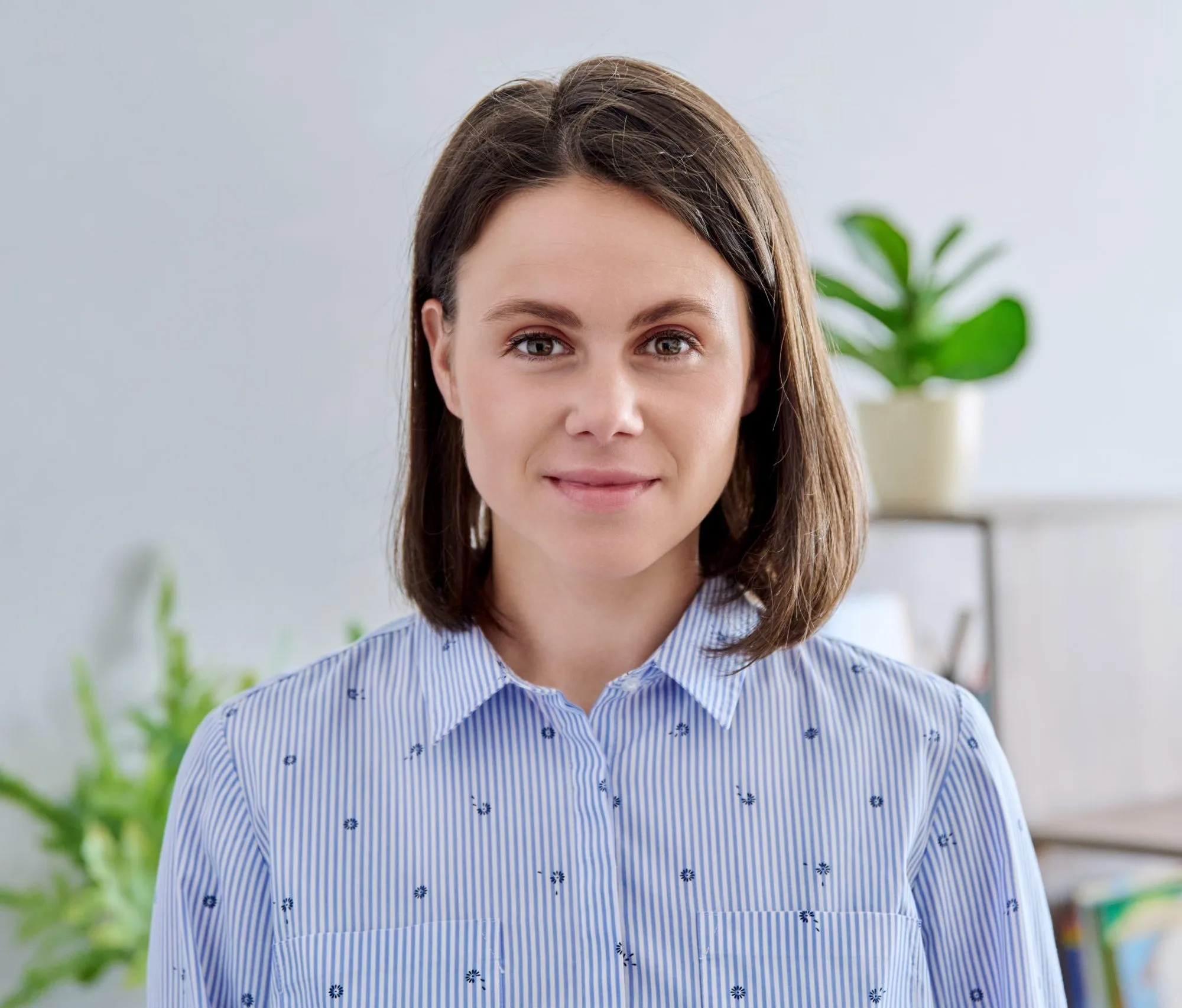 Woman in a striped blouse smiling
