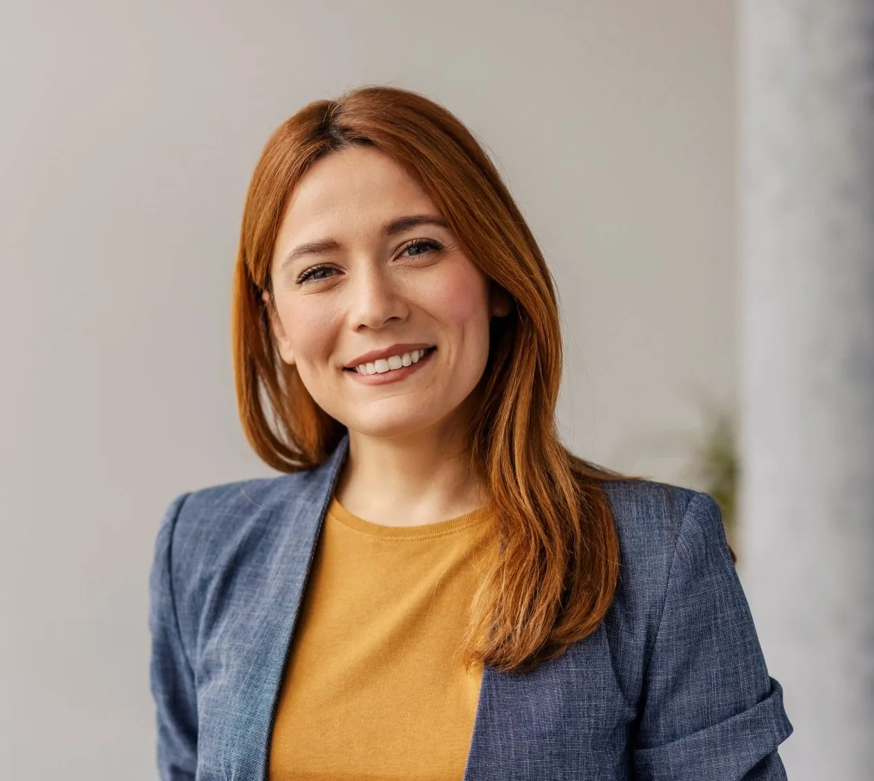 Smiling woman in a blazer