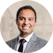 Male physician in business attire and tie, headshot portrait