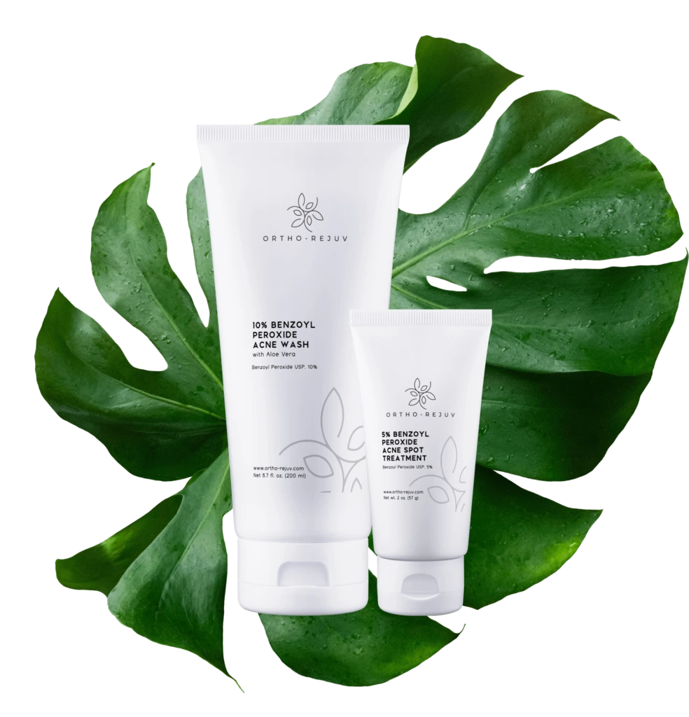 Image of two skincare products with green leaves in the background