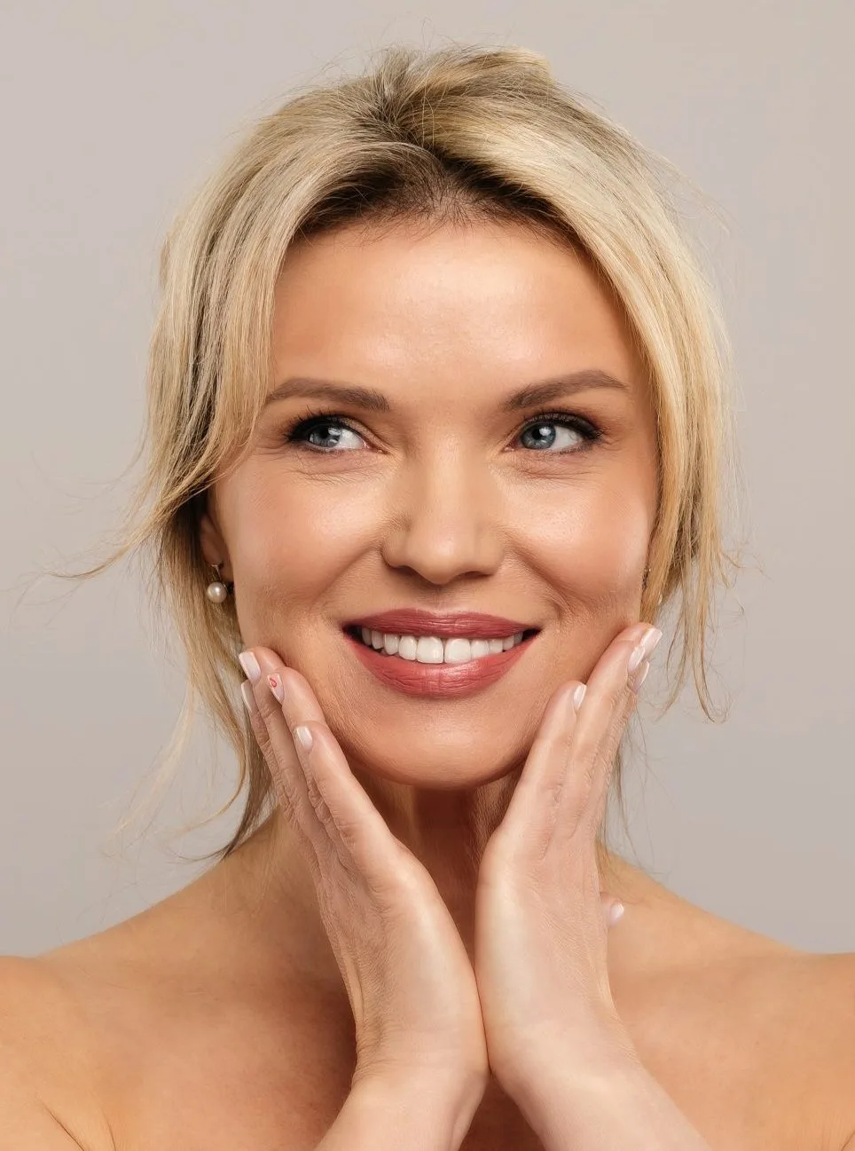 Smiling woman with healthy, glowing skin