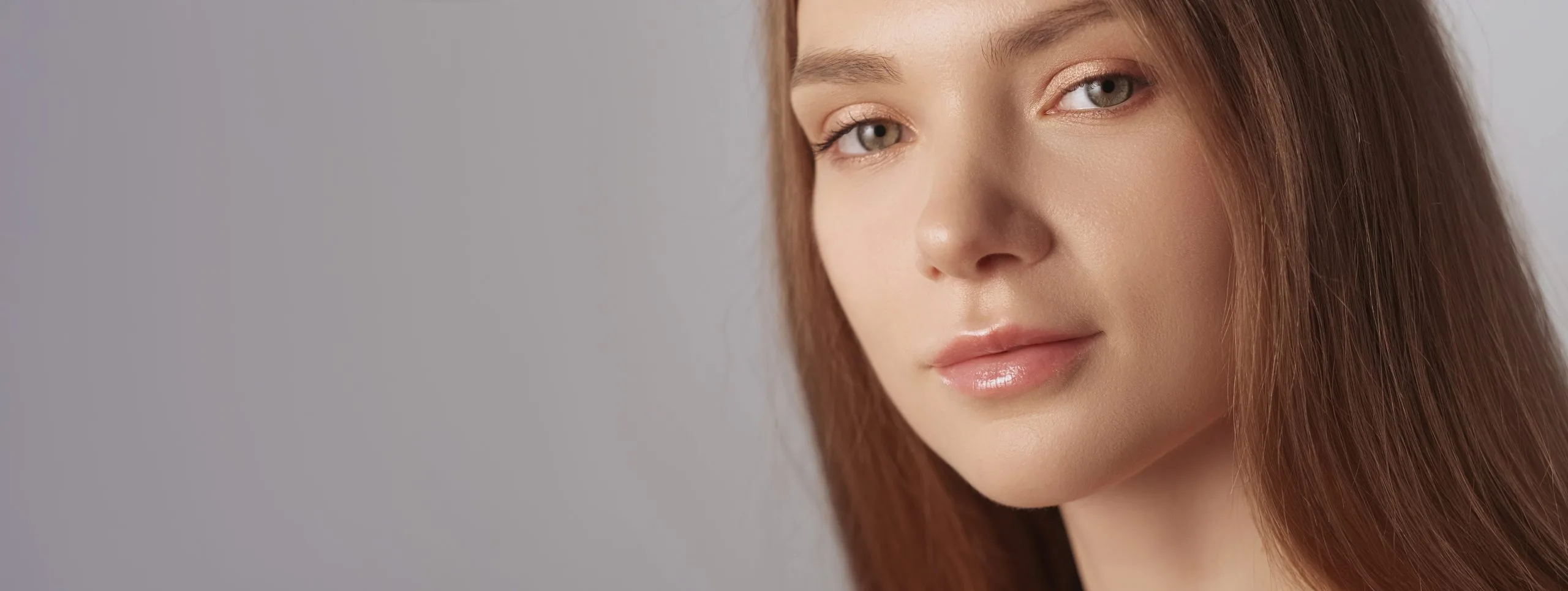 Woman with smooth, even-toned skin after regenerative skin treatment