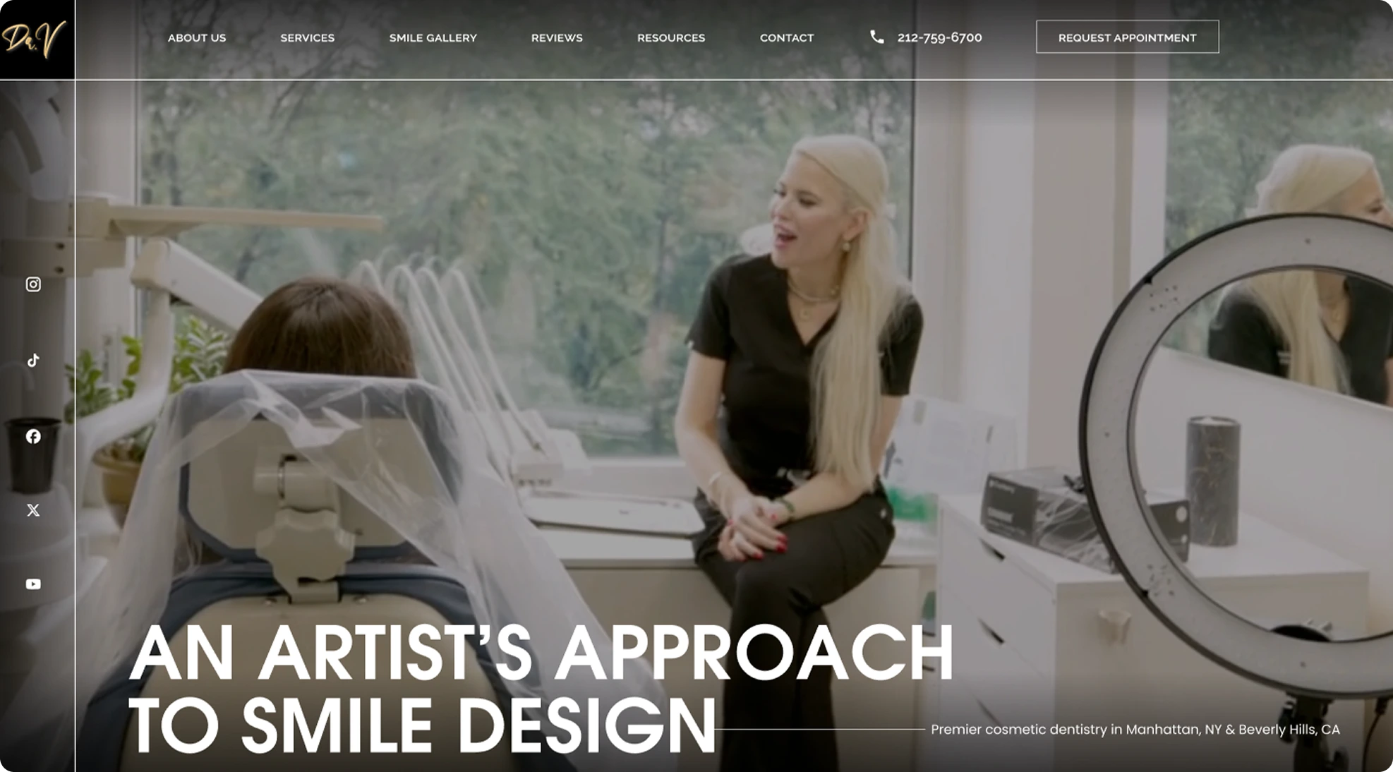 Dentist consulting with patient in treatment room with digital imaging equipment