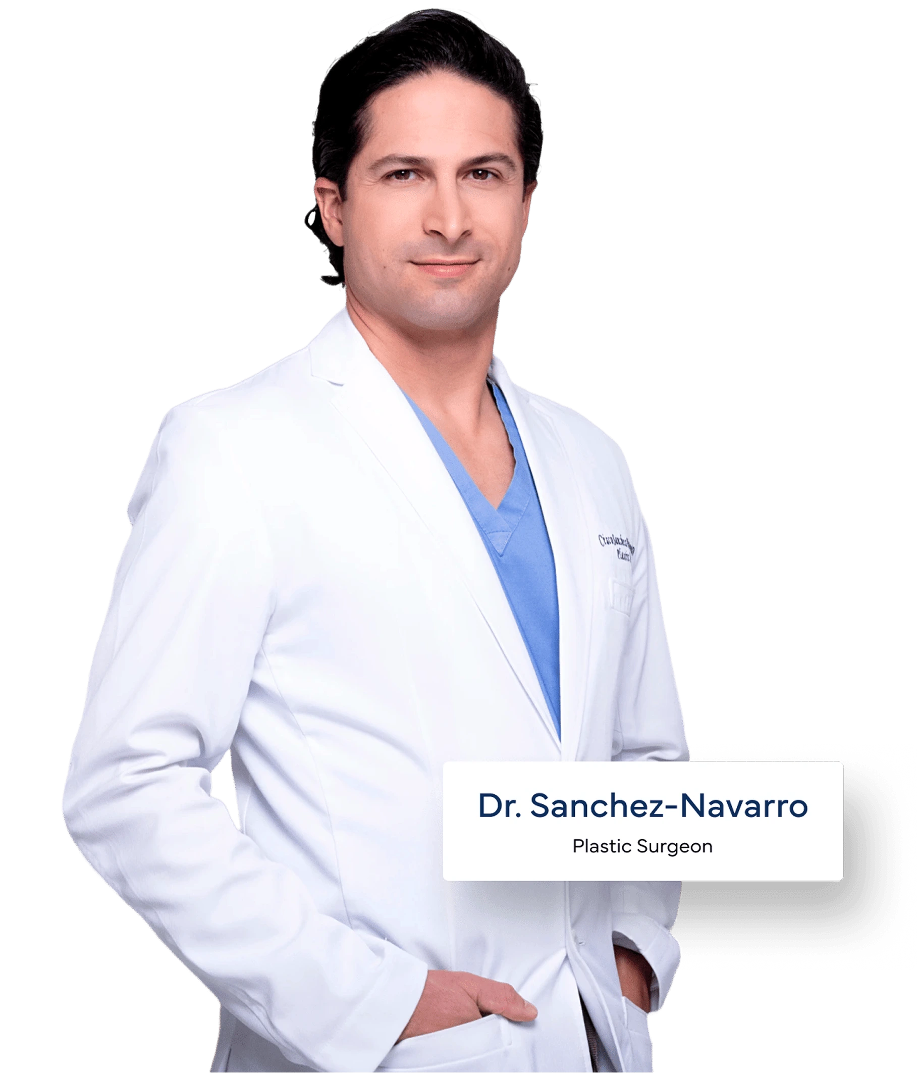 Dr. Sanchez-Navarro, plastic surgeon, wearing white coat over blue scrubs