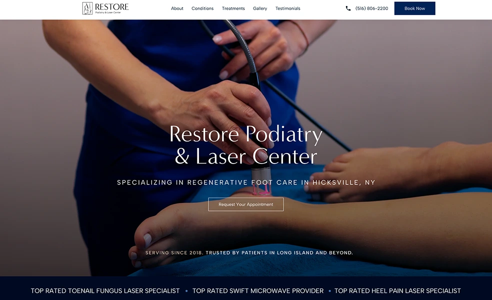 Podiatrist performing laser treatment on patient's foot at Restore Podiatry & Laser Center in Hicksville, NY