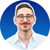 Man wearing glasses with blue circular background
