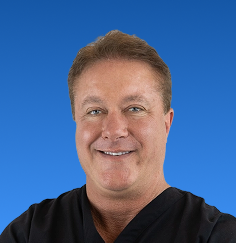 Charles Pray, D.C., chiropractor wearing black shirt smiling against blue background