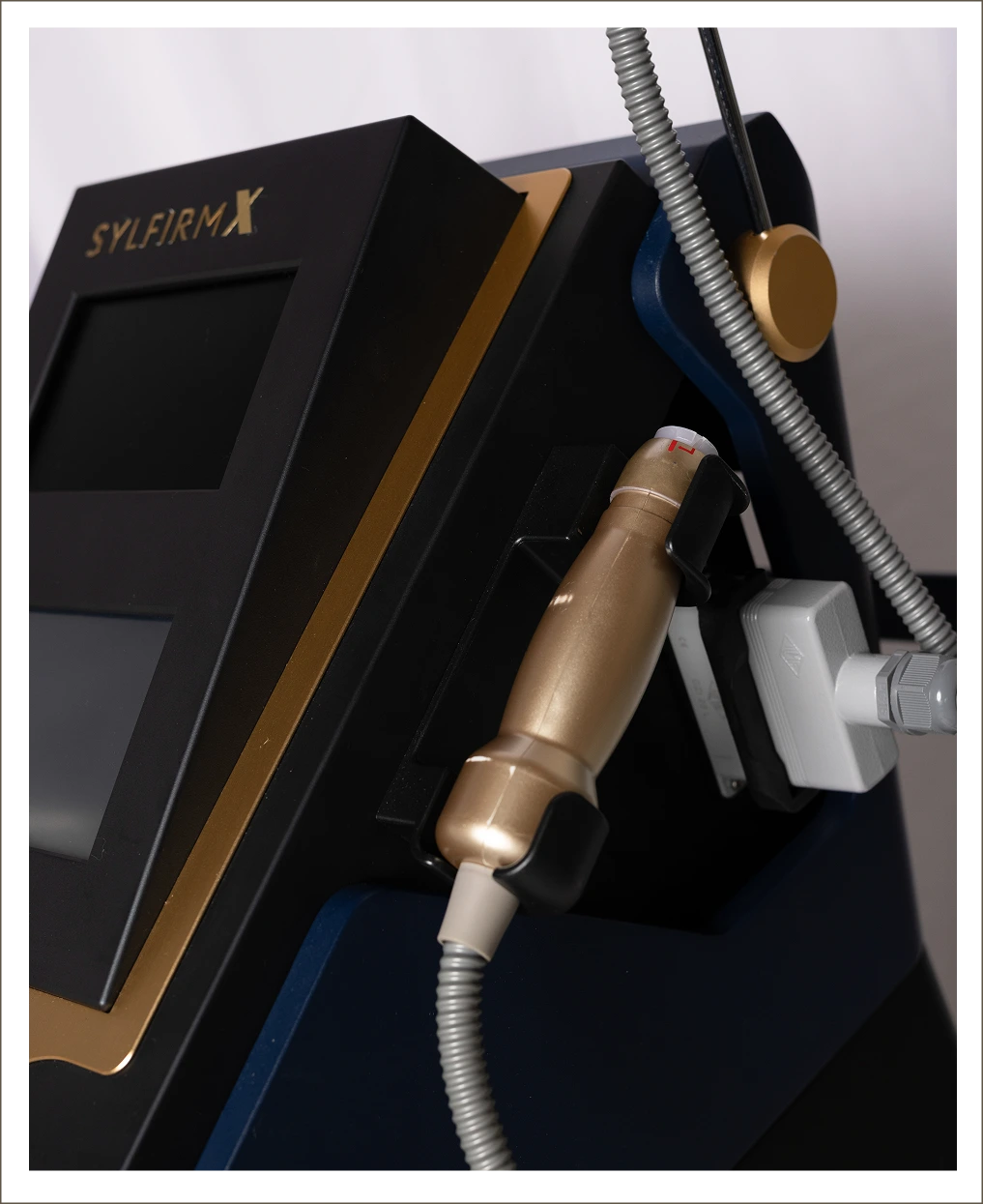 Sylfirm X microneedling device with gold handpiece and control console
