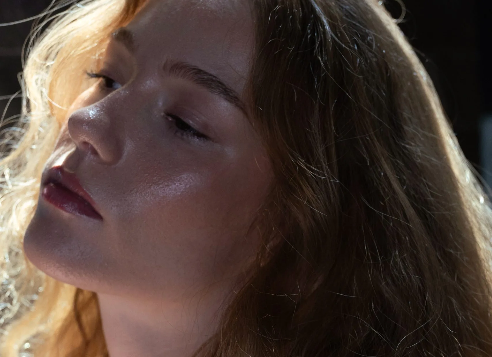 Close-up of woman's face in profile with natural lighting