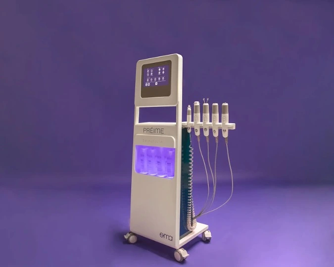 PARIME aesthetic facial machine with digital display, illuminated chamber, and five treatment applicators on wheeled stand