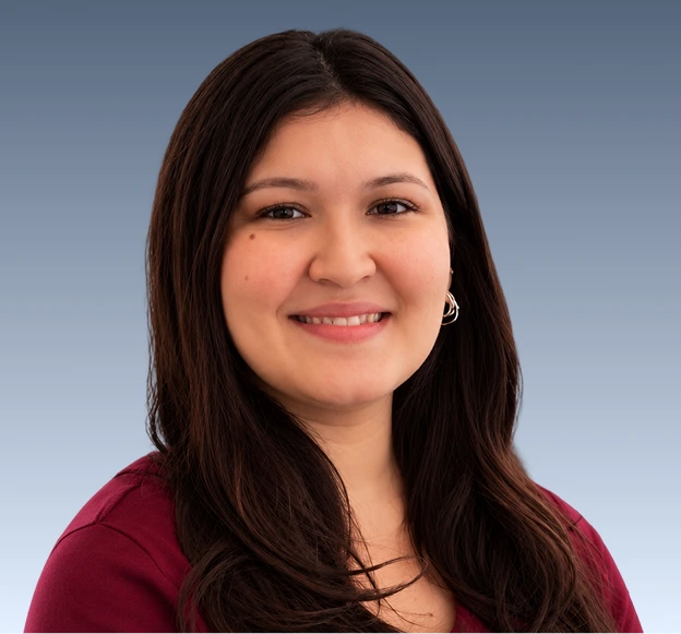 Aydee Porras, Patient Intake staff member at Progressive Movement Inc., smiling at the camera