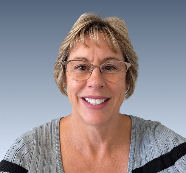 Becky Slayton, Director of Clinical Services & Credentialing, smiling at camera