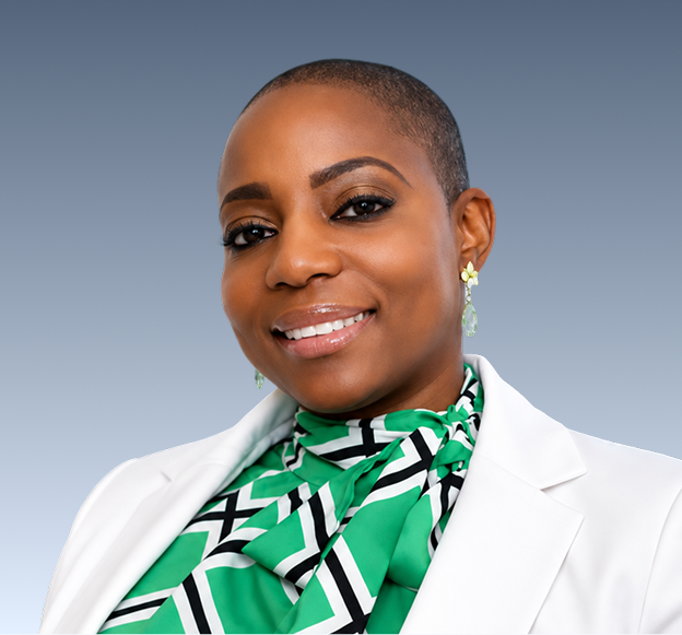 Becky Slayton, Director of Clinical Services & Credentialing, smiling at camera in white blazer