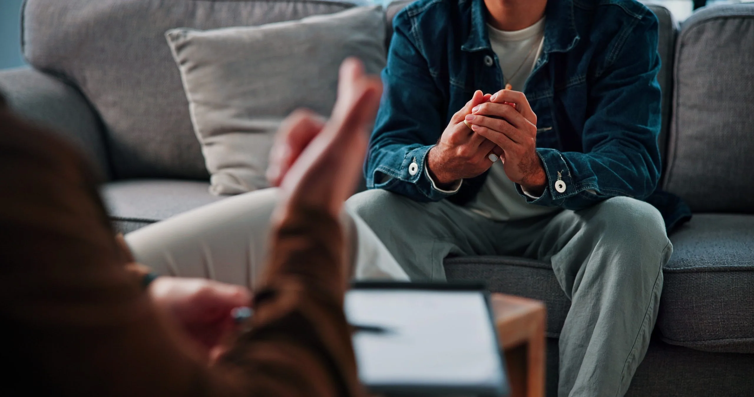 Man talking with a psychiatrist during a session in San Bernardino, CA