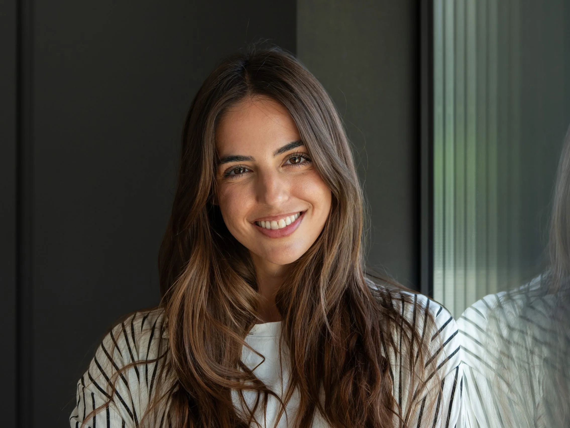 Smiling young woman, representing psychiatric care in Victorville, CA