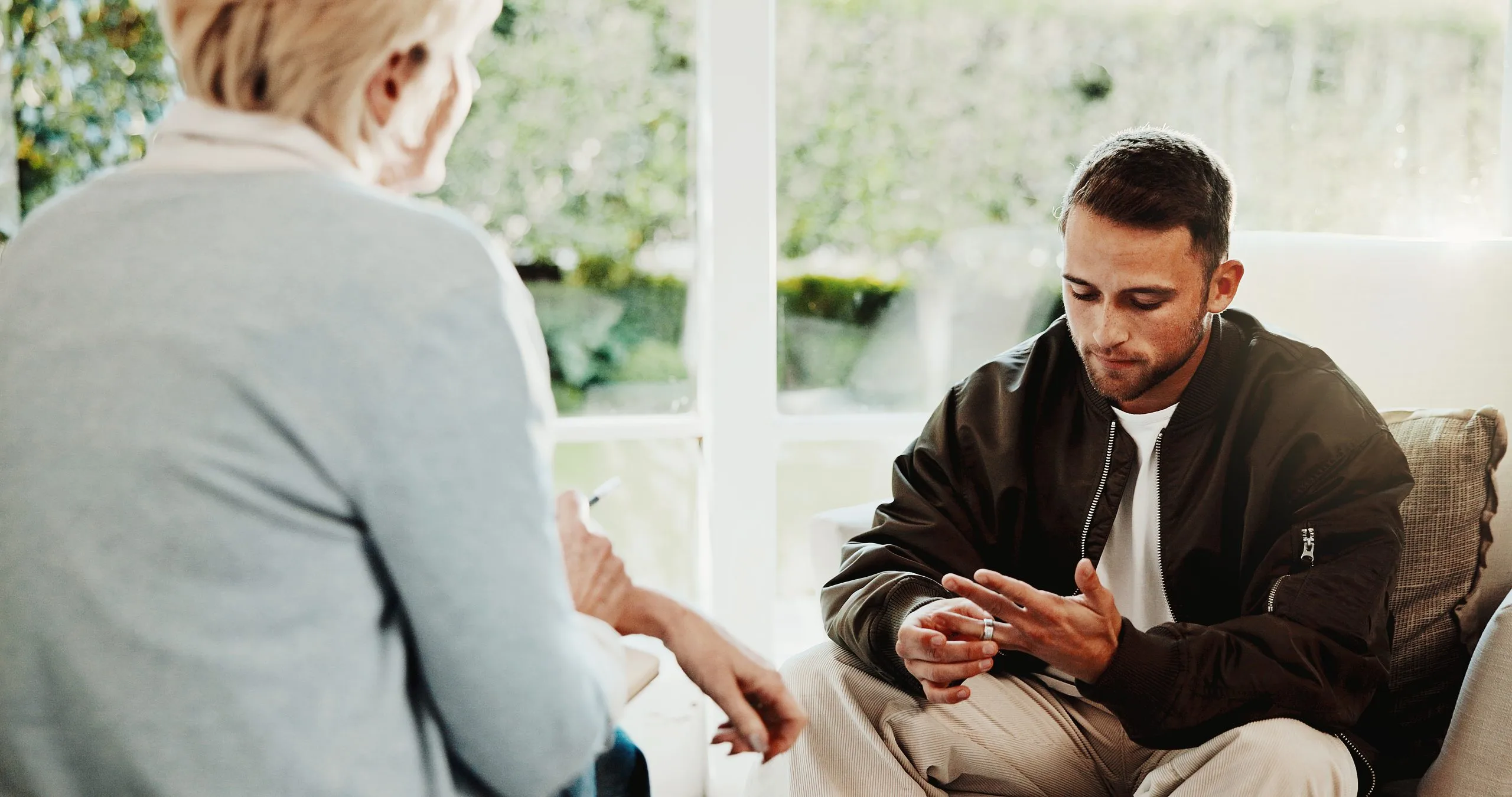 Man speaking with a therapist during a session in Victorville, CA