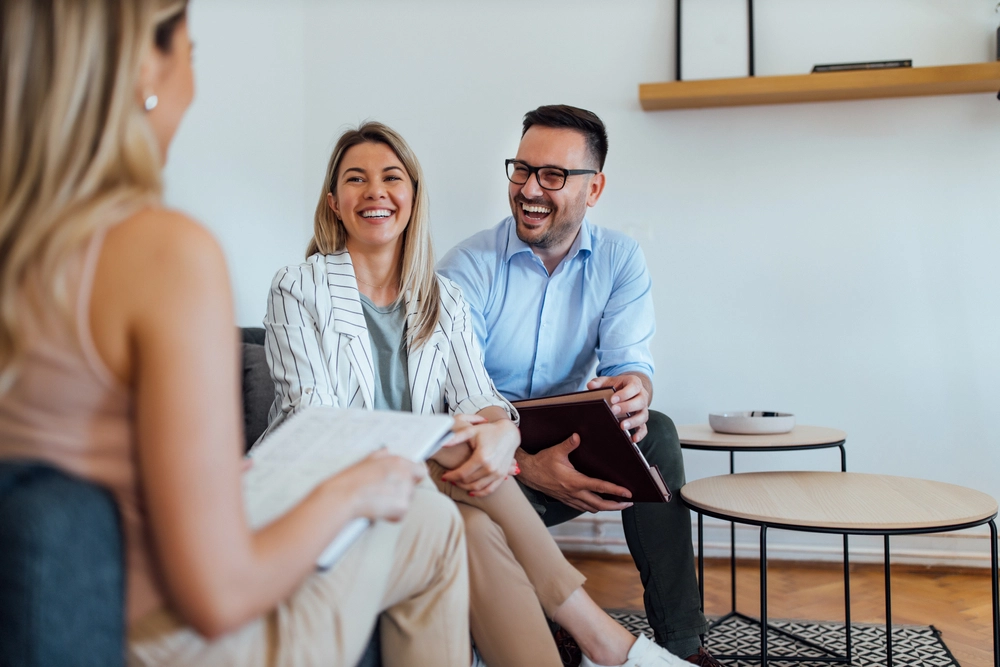 Three Business People Having Fun On A Meeting Portrait.