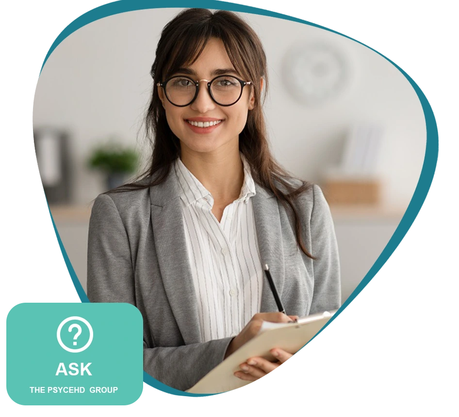 Smiling therapist holding a clipboard