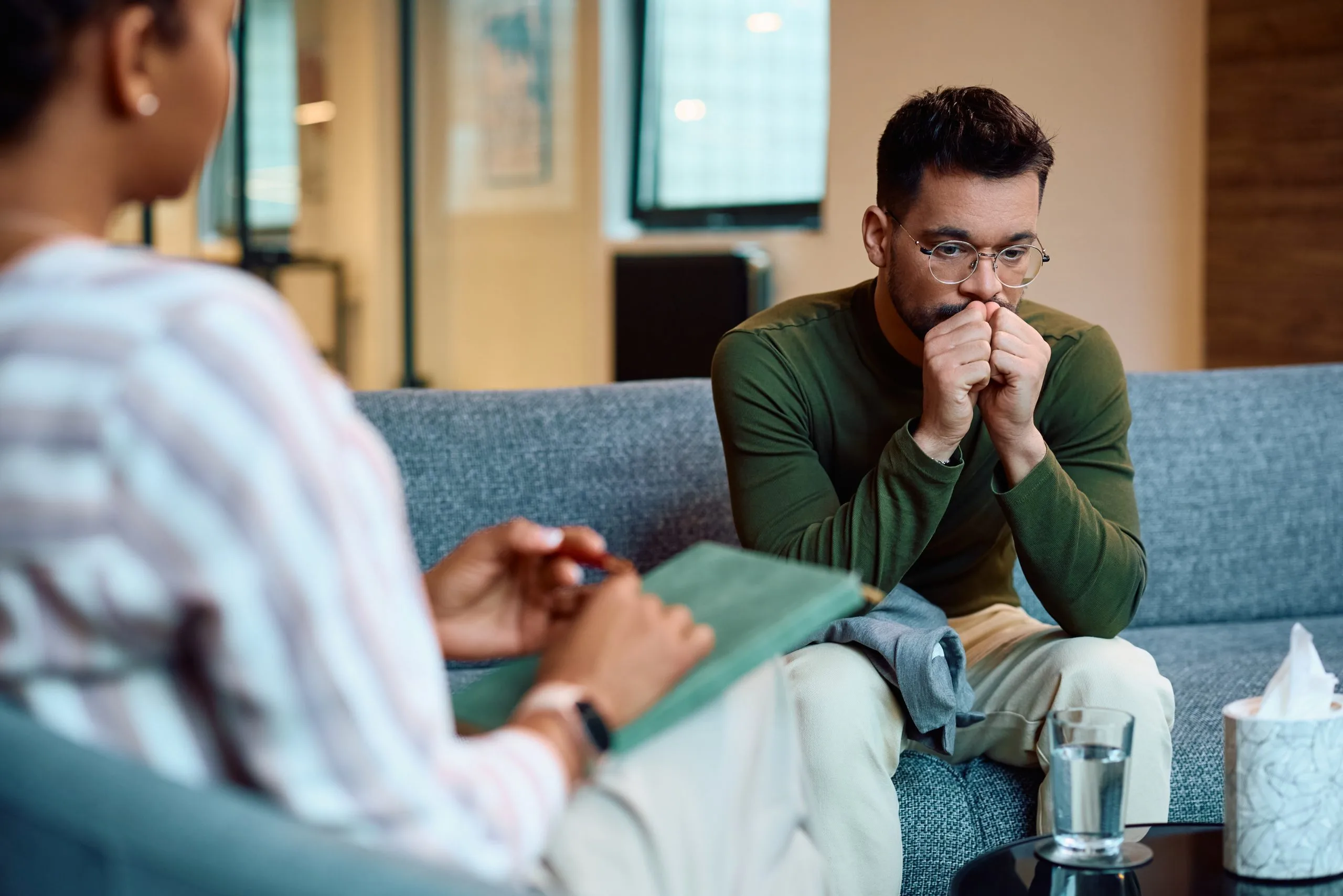 Young man talking with a therapist