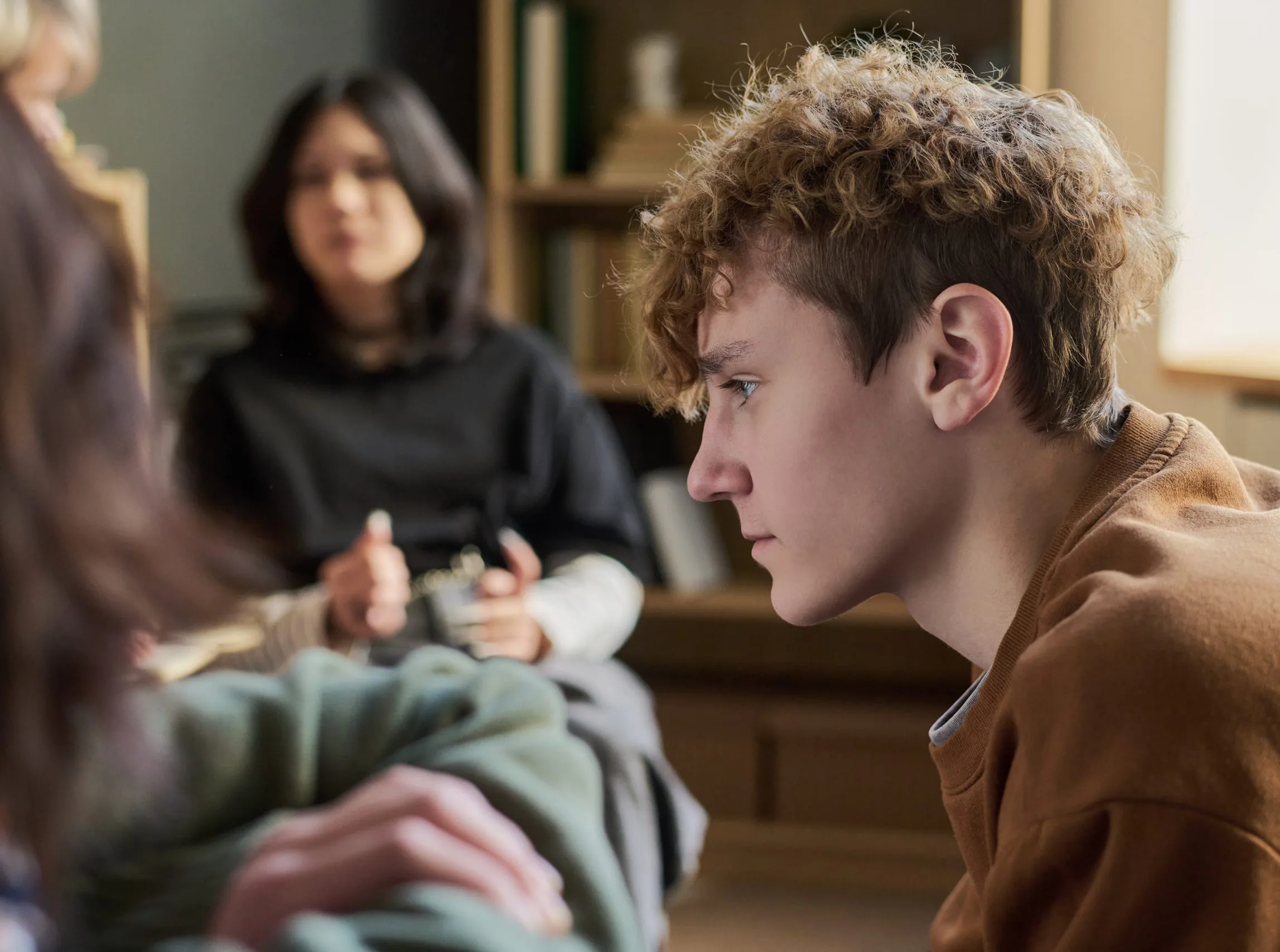 Teen boy in a therapy session