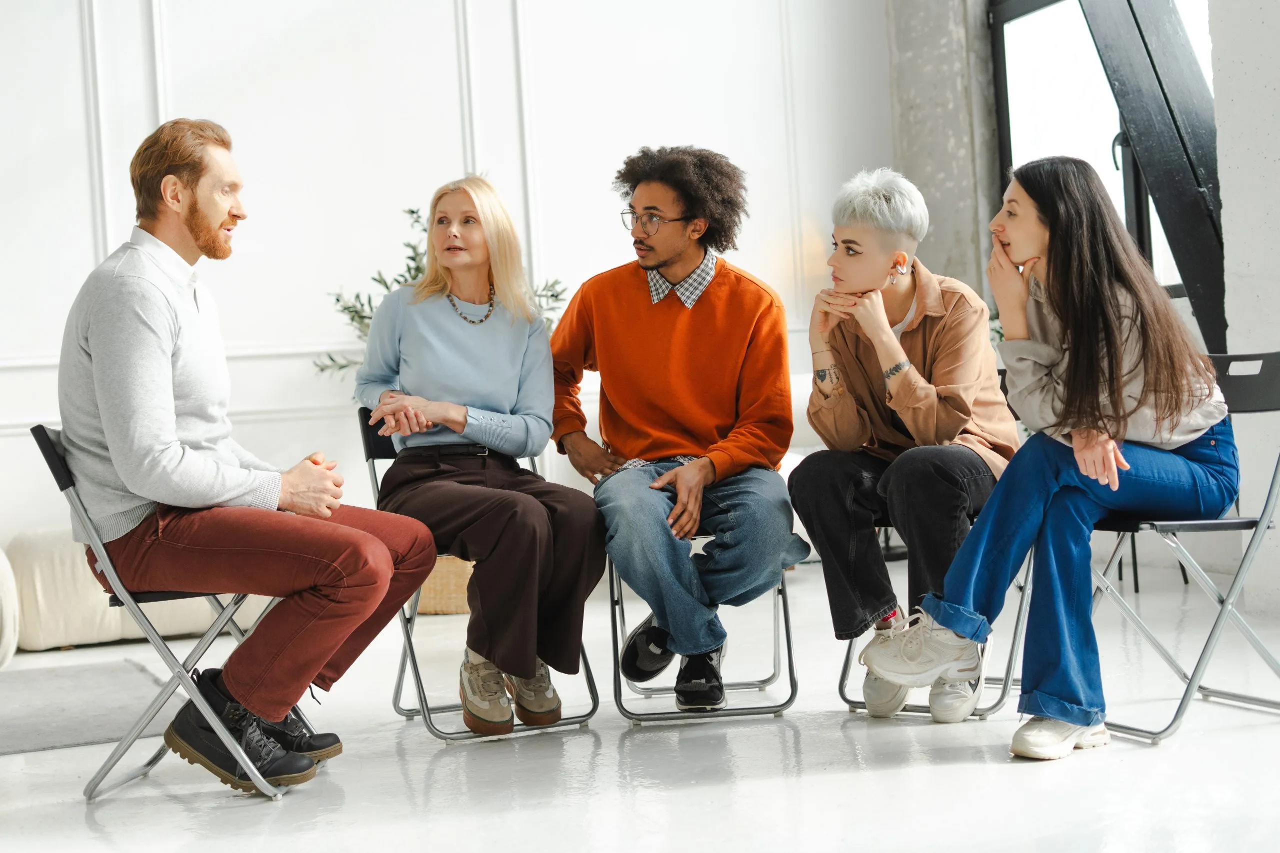 Support group sitting in a circle