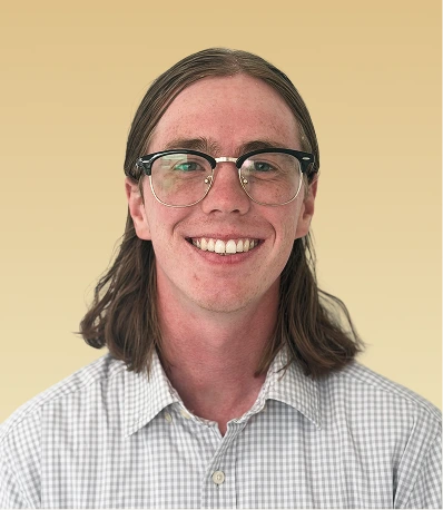 Deegan Eggleston, a member of the practice's multidisciplinary team, smiling at the camera
