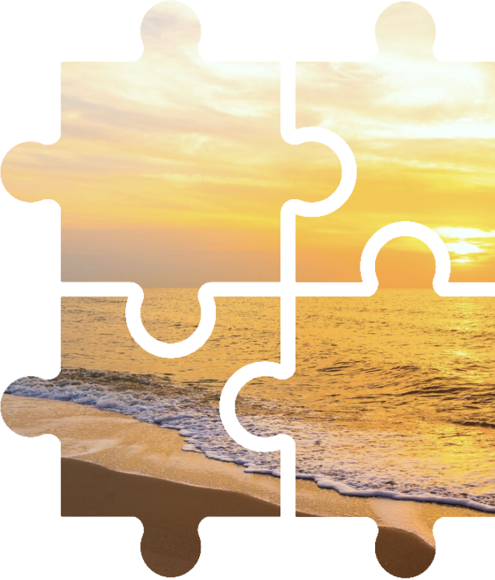 Puzzle pieces forming a beach sunset scene