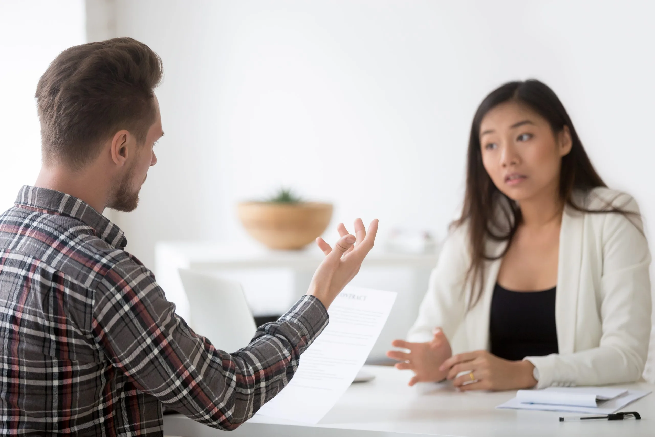 Therapist and patient discussing treatment during a counseling session