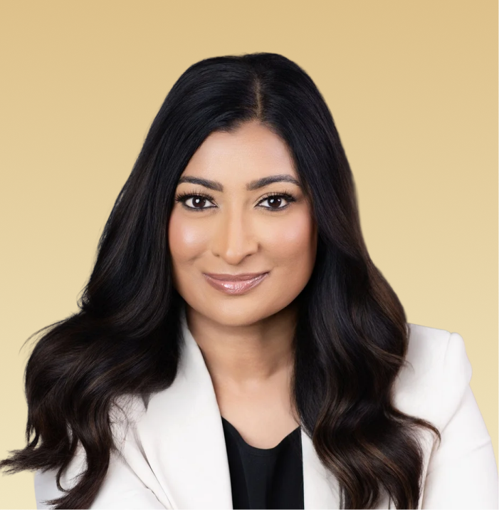 Yojana Veeramasuneni, Psy.D., LMSW, professional headshot against tan background