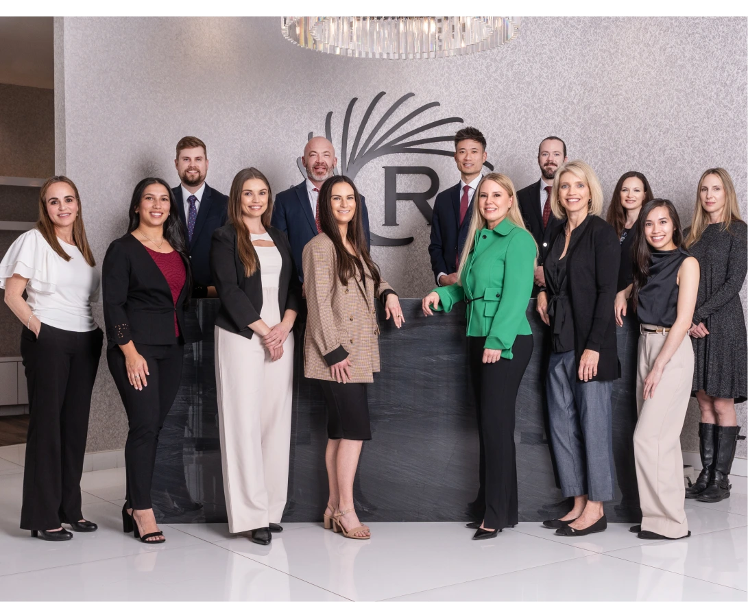 Regency Specialties team of 12 healthcare professionals standing together in front of office logo