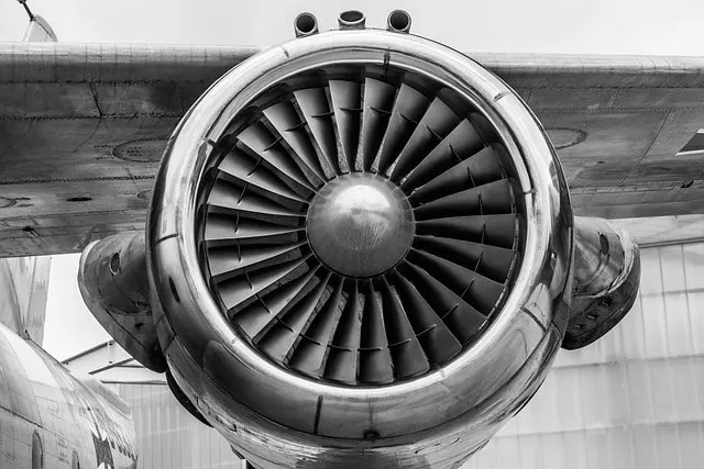 Close-up of jet engine turbine with radiating fan blades and central hub