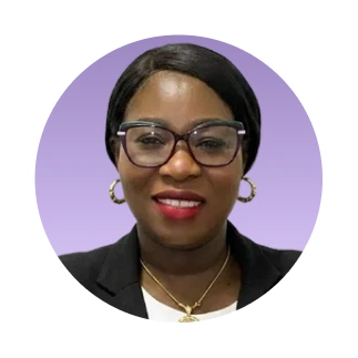 Professional headshot of a woman with glasses and gold jewelry against a purple background
