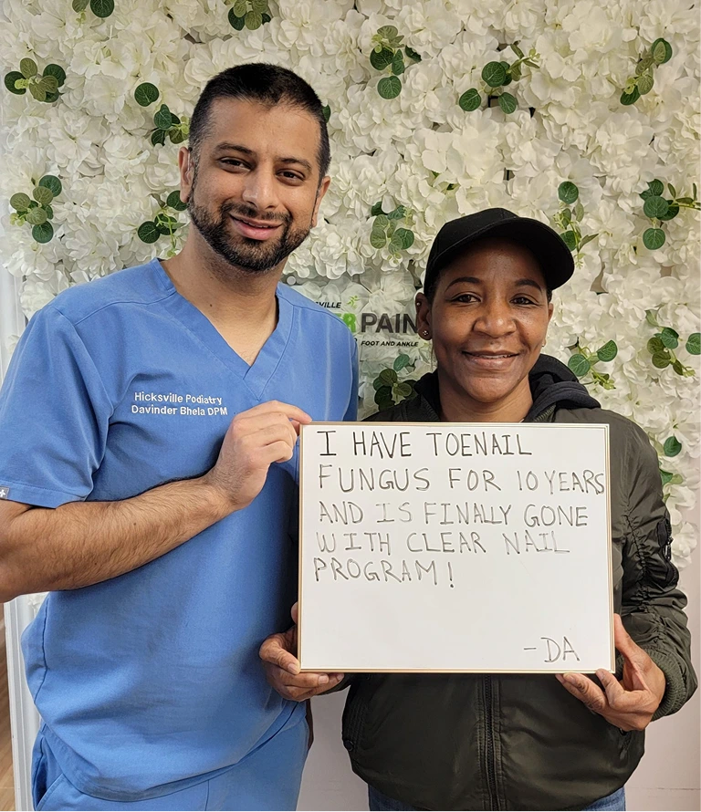 Podiatrist Dr. Davinder Bhela with patient holding testimonial about toenail fungus treatment with Clear Nail Program