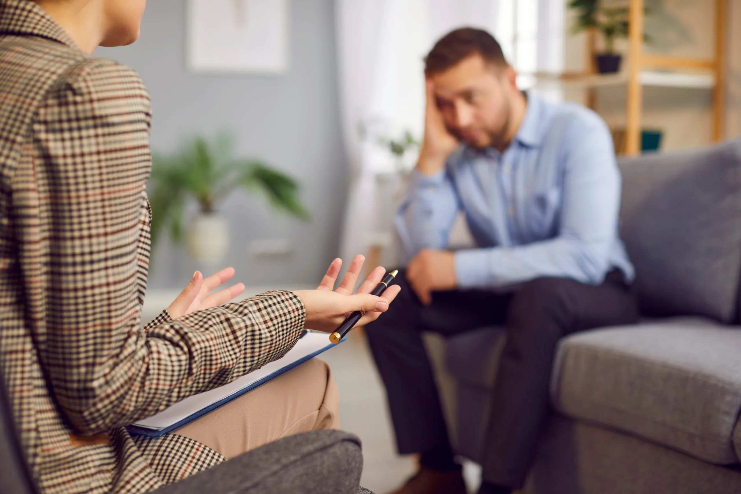 Female psychiatric provider consulting an upset patient in Ontario, CA