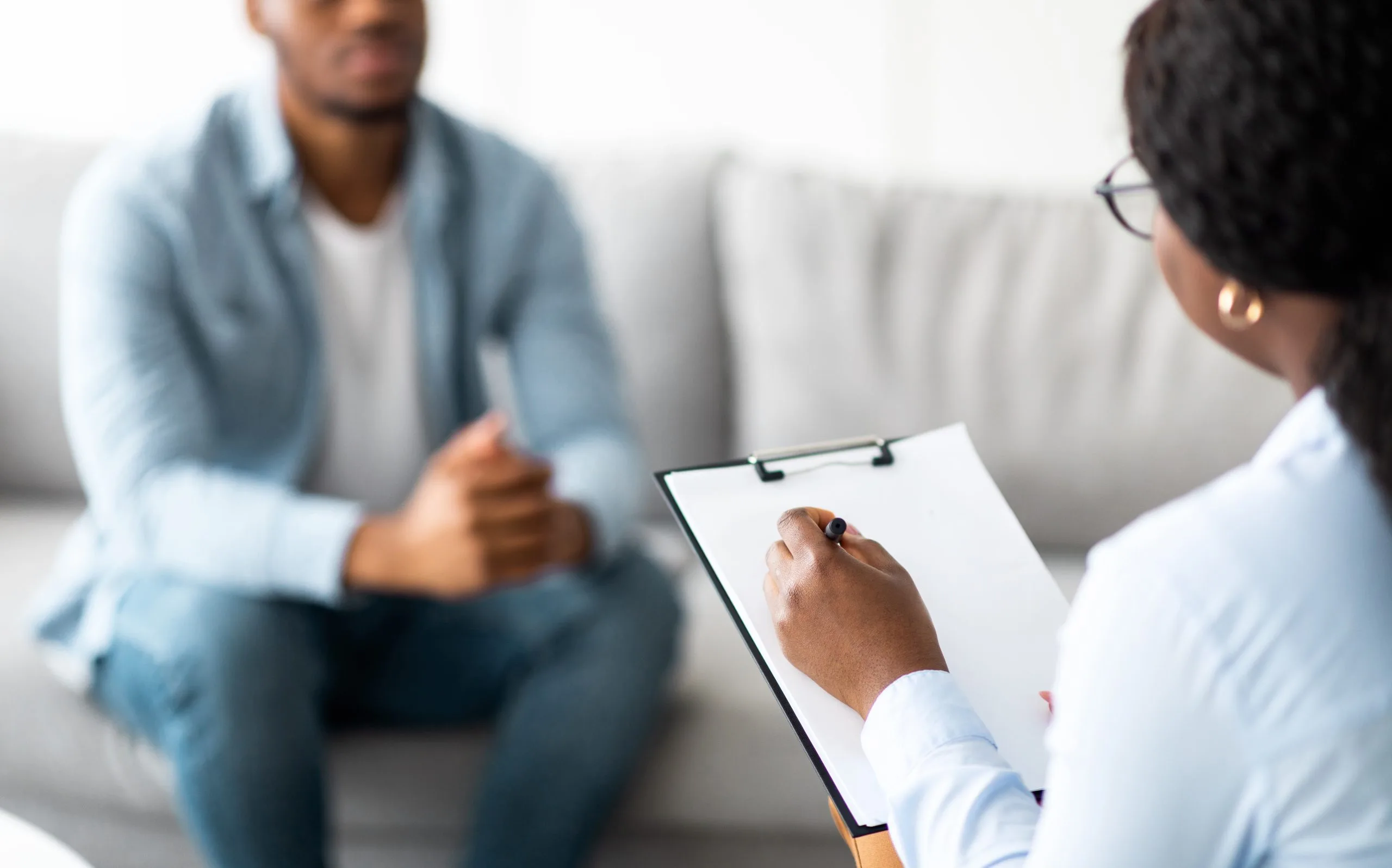 Young Black man in a therapy session for depression or PTSD in Pomona, CA