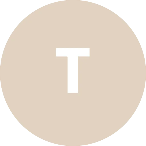 Letter T on beige circular background
