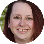Amanda Gayle, woman with long dark hair smiling at the camera