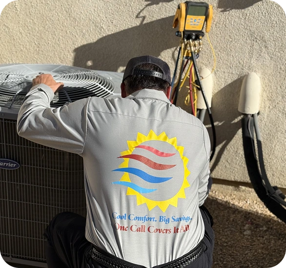 Technician wearing Sunlogix logo shirt working on air conditioning unit with surveying equipment mounted above