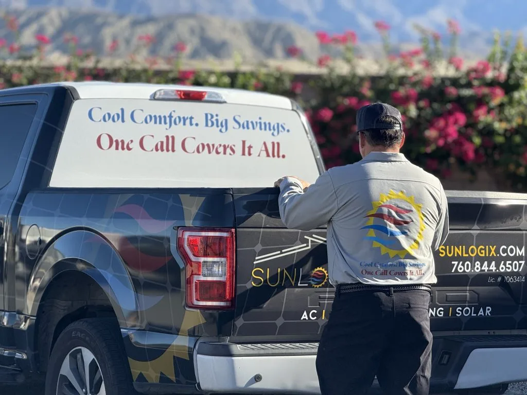Sunlogix technician standing beside service van with text 'Cool Comfort. Big Savings. One Call Covers It All' in desert landscape