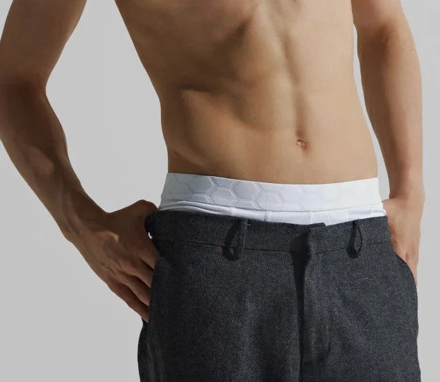 Collage of four shirtless men showing varied physiques against neutral backgrounds