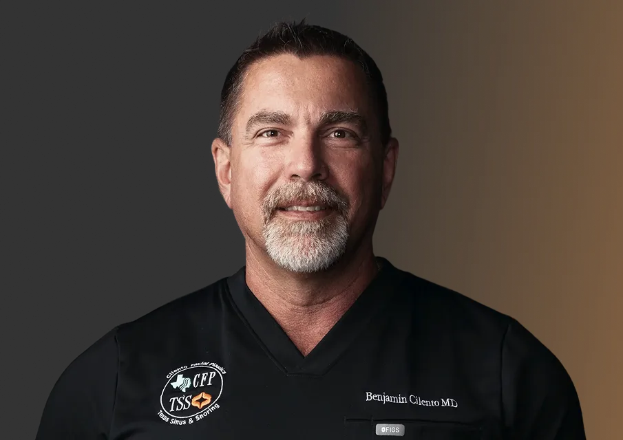 Benjamin Ciento MD in black scrubs with Texas Sinus and Snoring badge