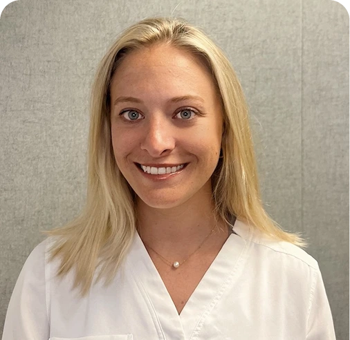 Emily Murtha, M.A., smiling at the camera in professional headshot