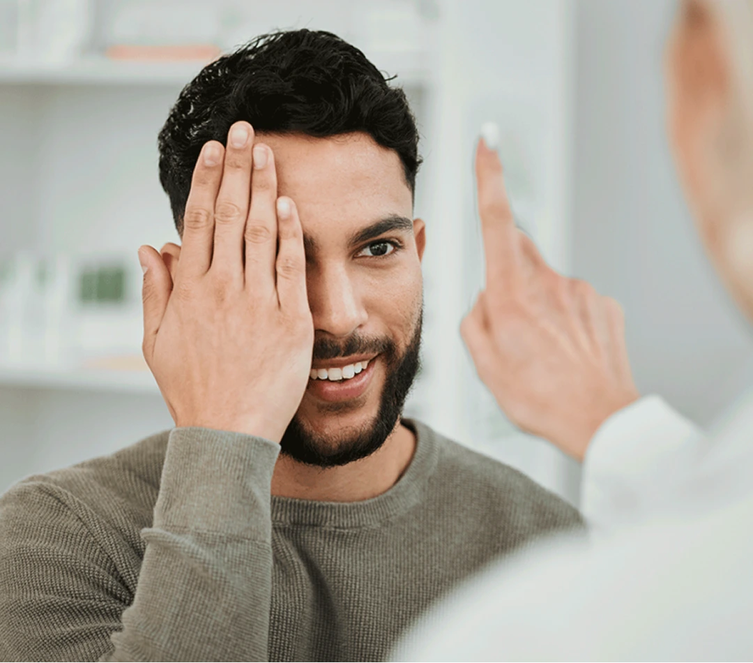 Clinician performing visual acuity or attention screening test with a patient during ADHD evaluation
