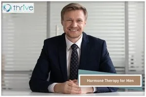 Man in business suit at desk with Hormone Therapy for Men label