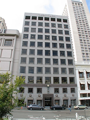Union Square office building facade in San Francisco with street-level storefronts