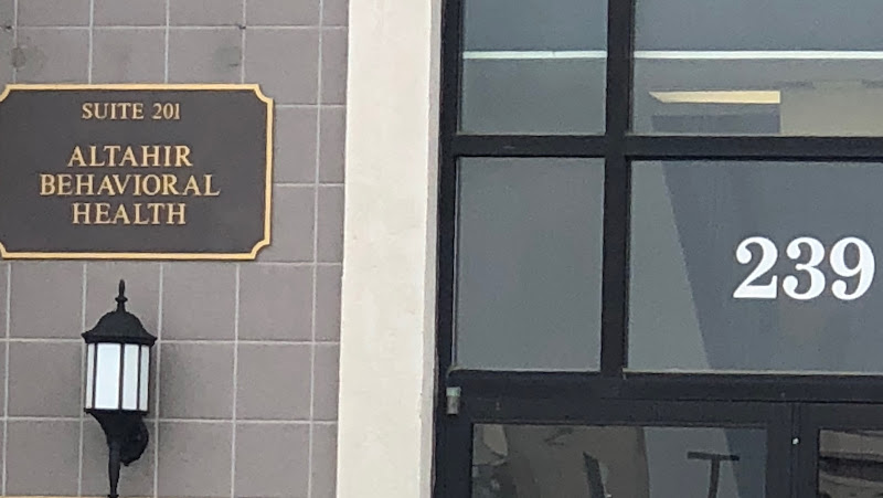 Altahir Behavioral Health Suite 201 office entrance sign on building facade