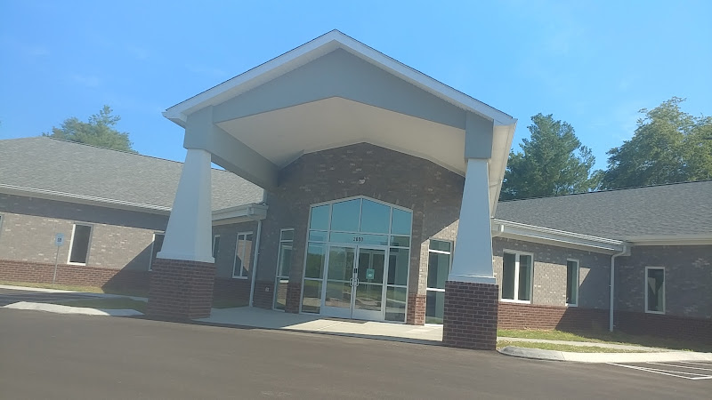 Astra Behavioral Health brick facility with covered entrance and landscaping