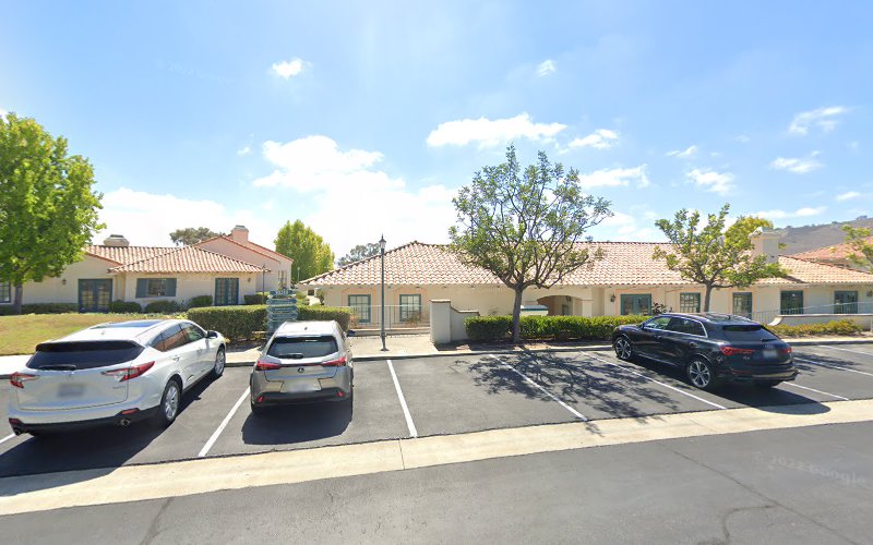 Inland Psychiatric Medical Group San Juan Capistrano medical facility with tan stucco exterior and parking lot
