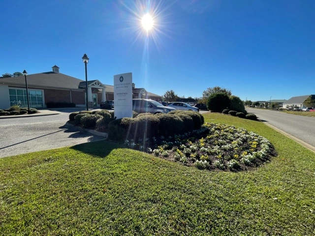 NeuroStar TMS Dothan by DBMC medical facility exterior with landscaping and clear blue sky
